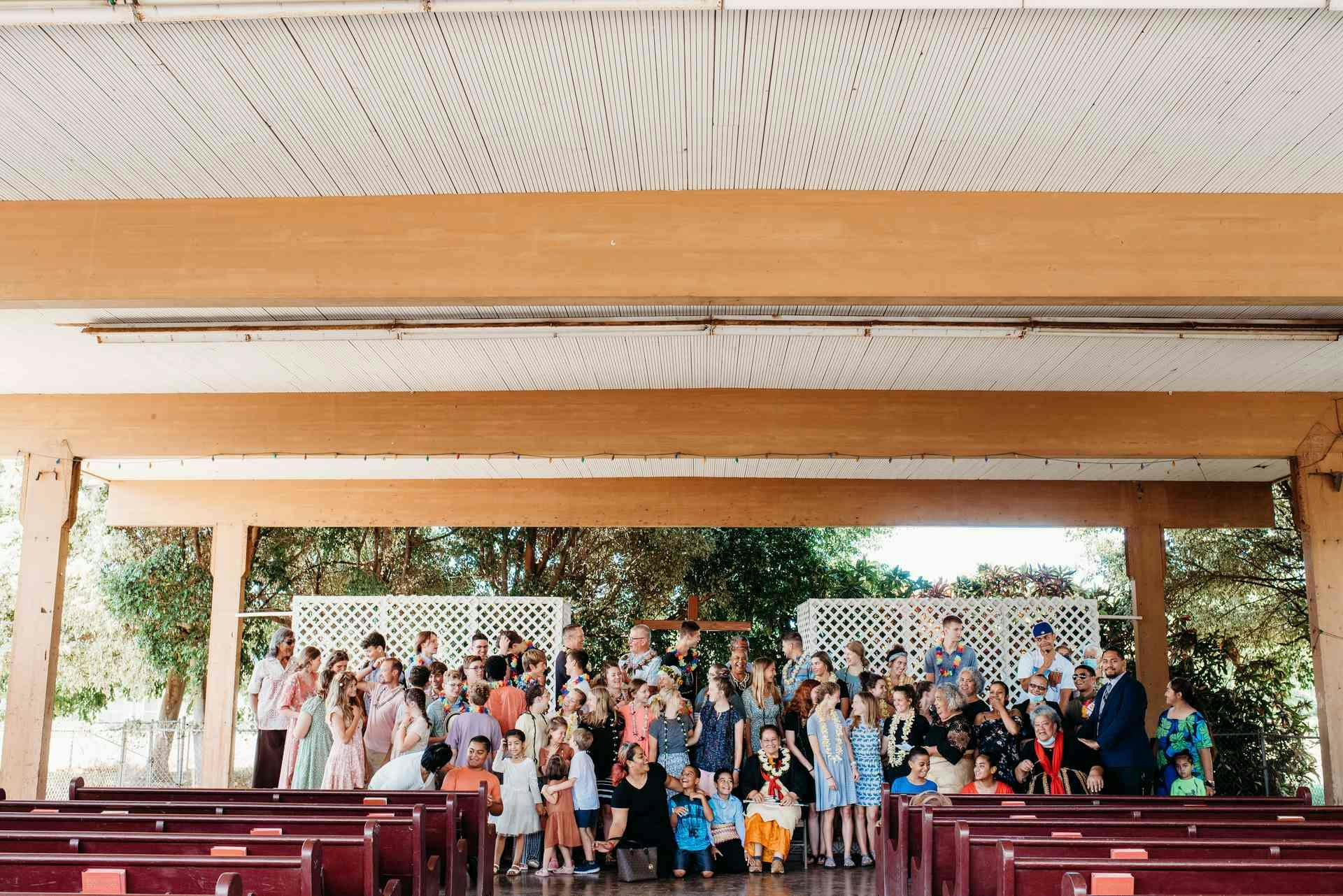 Mission team and host church together in front of sanctuary. 